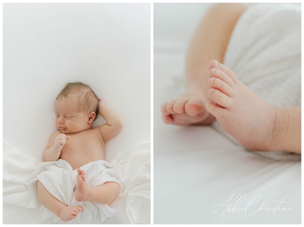 Newborn baby wrapped in white blanket by Abbie Christine photography. 